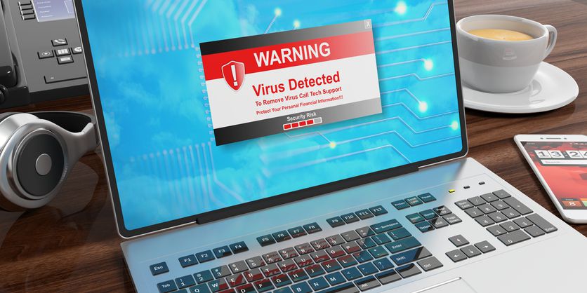 Virus alert on a laptop screen. 3d illustration Virus alert on a laptop screen on an office desk. 3d illustration
